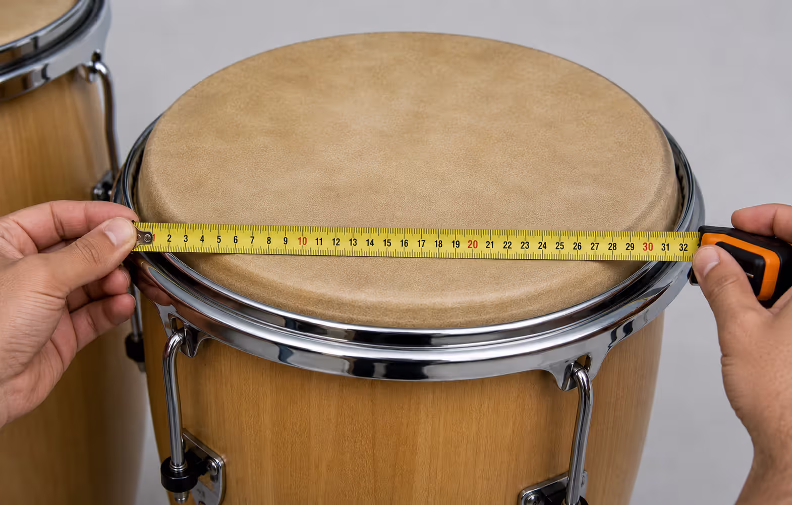 Measuring conga drum bearing edge diameter with tape measure